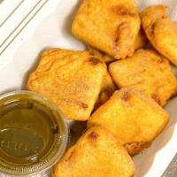 Paneer Pakora · Paneer pieces dipped in chickpea batter and deep fried
