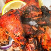 Tandoori Chicken Leg Full  · Marinated Tandoori Chicken Cooked in our clay oven (8 pieces)