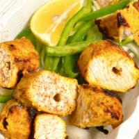 Tandoori Malai Chicken  · Chicken breast marinated in yogurt & spices & roasted 