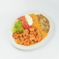 Camarones a la Plancha Plate · Grilled shrimp, prawns with onion, mild peppers, bacon, rice, beans, sour cream, guacamole, ...