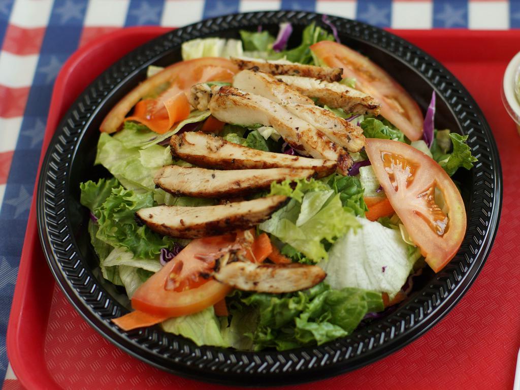 Grilled Chicken Chunk Salad · Romaine lettuce, shaved carrot, red cabbage, tomato, cucumber and grilled chicken. Please choose your dressing. 
