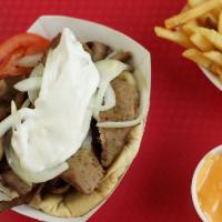 Gyros Sandwich · Delicious blend of lamb and beef with tzatziki sauce, tomato and onion on a grilled pita.