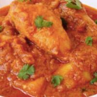 Chicken Karahi Curry · Chicken cooked with mild curry sauce and spices.