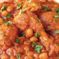Chicken Cholley · Garbanzo beans cooked with chicken.