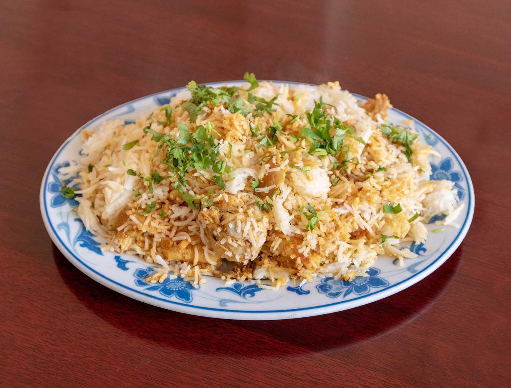 Chicken Biryani · Fried rice cooked with chicken biryani.