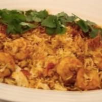 Shrimp Biryani · Basmati rice cooked with shrimp and spices.