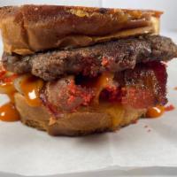 Fire Ball  Hot cheeto Sandwich  · Beef patty or Grilled Chicken, hot sauce cheese, flaming hot cheeto dust, bacon, and grilled...