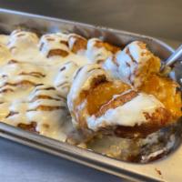 The Lush  Baked Cobblers · Flaky homemade baked cobbler style desserts with cinnamon, brown sugar, topped with icing gr...