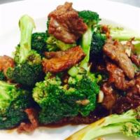 50. Beef with Broccoli · Served with rice. 