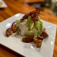 Zaza Wedge Salad · iceberg slice, hickory bacon, tomato, avocado, cucumber, creamy Danish blue and house croutons