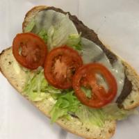 Steak Sub · Rib eye steak meat sliced ultra thin on a sub roll with lettuce, tomato, mayo, cooked onions...