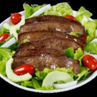 Gyro Salad · Juicy gyro meat, crisp romaine lettuce, fresh onions, ripe tomatoes, crunchy cucumbers and g...