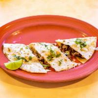 Quesadillas · Choice of meat, cilantro, onions, radish, lime, and sour cream on the side