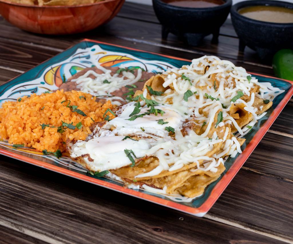 Chilaquiles con Carne · Red or green, served with sour cream, cheese and your choice of steak, spicy pork, ground beef, chicken or eggs.