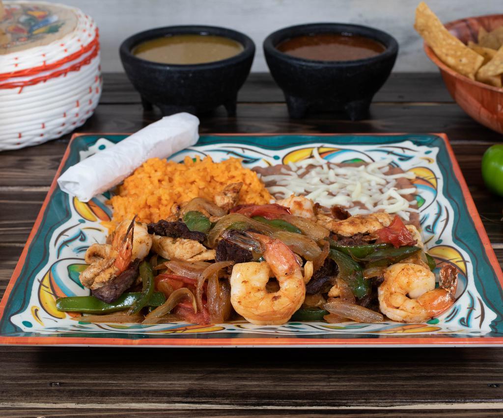 Fajitas Mix · Chicken, shrimp and steak. Served with Rice and beans.