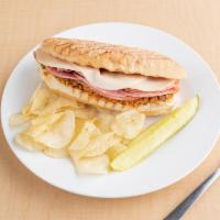 2. Muffaletta Sandwich · Served hot. Black Forest ham, salami, mortadella, melted provolone and covered with Sorella'...