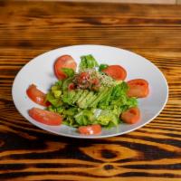 Green Salad · Lettuce, tomato, onions and avocado.