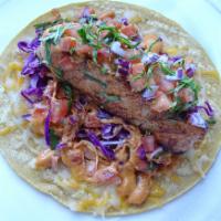 Fish Taco · Yellow corn tortilla, grilled salmon, cheese, green and red cabbage, tomatoes, red onion, ci...