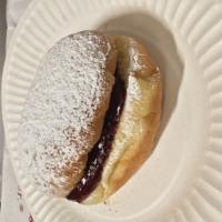Powdered Sugar Jelly · Raspberry Jelly Donut with a Powdered Sugar Topping