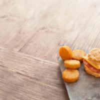 Country Ham and Egg Biscuit Combo · Cured country ham on a made-from-scratch buttermilk biscuit, grilled and made better with an...