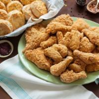 Box of 20 Pieces and 10 Biscuits · 20 pieces of delicious fried chicken, seasoned to perfection and served with 10 made-from-sc...