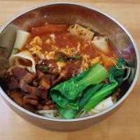 N11. 3-in-1 Biang-Biang noodle 三合一裤带面 · Sizzling oil, egg tomato gravy and Shaanxi style minced pork.