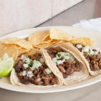 Asada Taco · Served with onions and cilantro. 