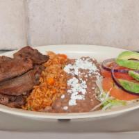 Ranchera Plate · Served with rice and beans. 