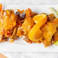 Jumbo Chicken Wings · Your choice (sweet and spicy orange, buffalo, or BBQ) carrots and celery sticks, blue cheese...
