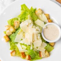 Caesar Salad · Romaine lettuce, garlic croutons, homemade Caesar dressing.