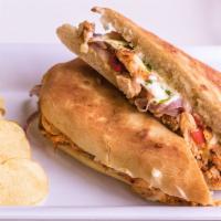 Chicken Pardiso Sandwich · Garlic herb sauce, chicken breast, roasted red peppers, mozzarella, red onion, lettuce and m...