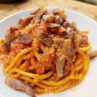 Bucatini Amatriciana · San Marzano tomato sauce, guanciale, pecorino, peperoncino, and black pepper.