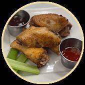 Chicken Wings · Chicken wings breaded and lightly seasoned. Served with BBQ sauce, honey mustard or Buffalo ...