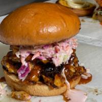 BBQ Chopped Chicken Sandwich · Mustard-based BBQ sauce, topped with slaw.