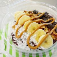 Ultimate Crave Bowl · Base: organic acai, blueberries, banana and almond milk. Topping: banana, homemade granola, ...