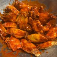 15 Pieces Chicken Wings · Cooked wing of a chicken coated in sauce or seasoning.