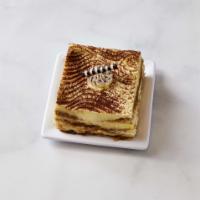 Tiramisu Slice · Lady finger sponge cake soaked with coffee syrup and layered with sweet mascarpone cheese.