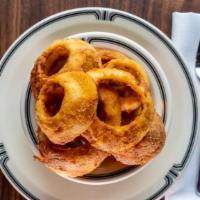 Homemade Onion Rings · Lightly hand breaded onion rings fried to a golden perfection.