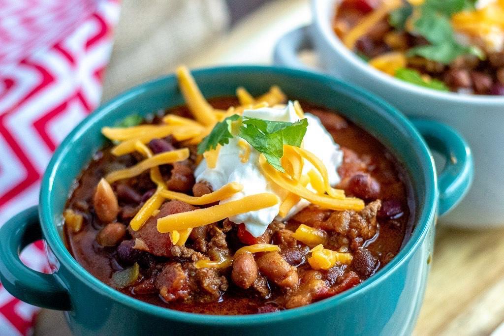 Chili  · BBQ Beef Chili served with Cheddar Cheese, Chopped Onions and Sour Cream