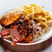 BBQ Beef Brisket Sandwich · Sliced brisket is served on an onion bun, topped with BBQ sauce and caramelized onions. Our ...