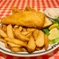 Fish & Chips  · The Real Deal. A Beautiful Filet of Wild Alaskan ½ Pound Cod Served Over Wedge Cut Chips wit...