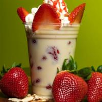Strawberries & Cream · Homemade sweet cream, fresh strawberries, sliced almonds, whipped cream, strawberry sauce