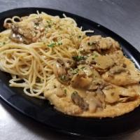 Chicken Marsala · Chicken cutlets sautéed with mushrooms in a marsala wine sauce. Served with choice of pasta.