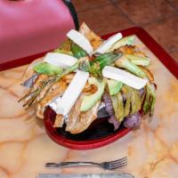 Molcajete Specialty · Grilled chicken, steak, shrimp, mexican sausage along with onions, bell peppers served with ...