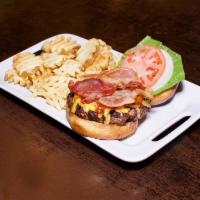 Tavern Burger · Topped with sauteed onions, bacon and cheddar. Smothered with spicy BBQ sauce.