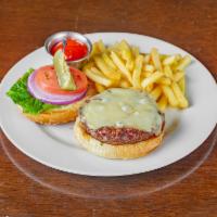 Hamburguesa Clasica · Grilled hamburger, onions, lettuce, tomato, pickled cucumber, sesame brioche bun cheddar, mo...