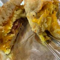 Breakfast Sandwich  · Bacon, scrambled egg, and cheddar cheese on focaccia. Add avocado for an additional charge.