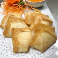 Crab Rangoon · 6 pieces. Fried wonton wrapper filled with crab and cream cheese. 