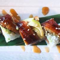 Hawaiian Roll · Spicy tuna, cucumber, tempura flakes topped with eel, eel sauce.