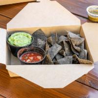 Blue Corn Chips & Guacamole · Freshly made Guacamole with our house made Blue Corn Chips